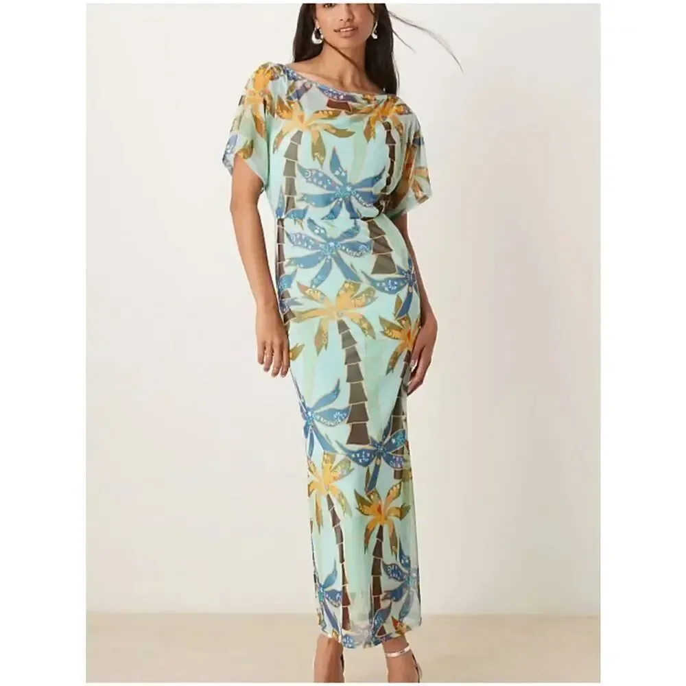 Never Fully Dressed Tilly off asymmetric mesh maxi dress in blue palm print New
